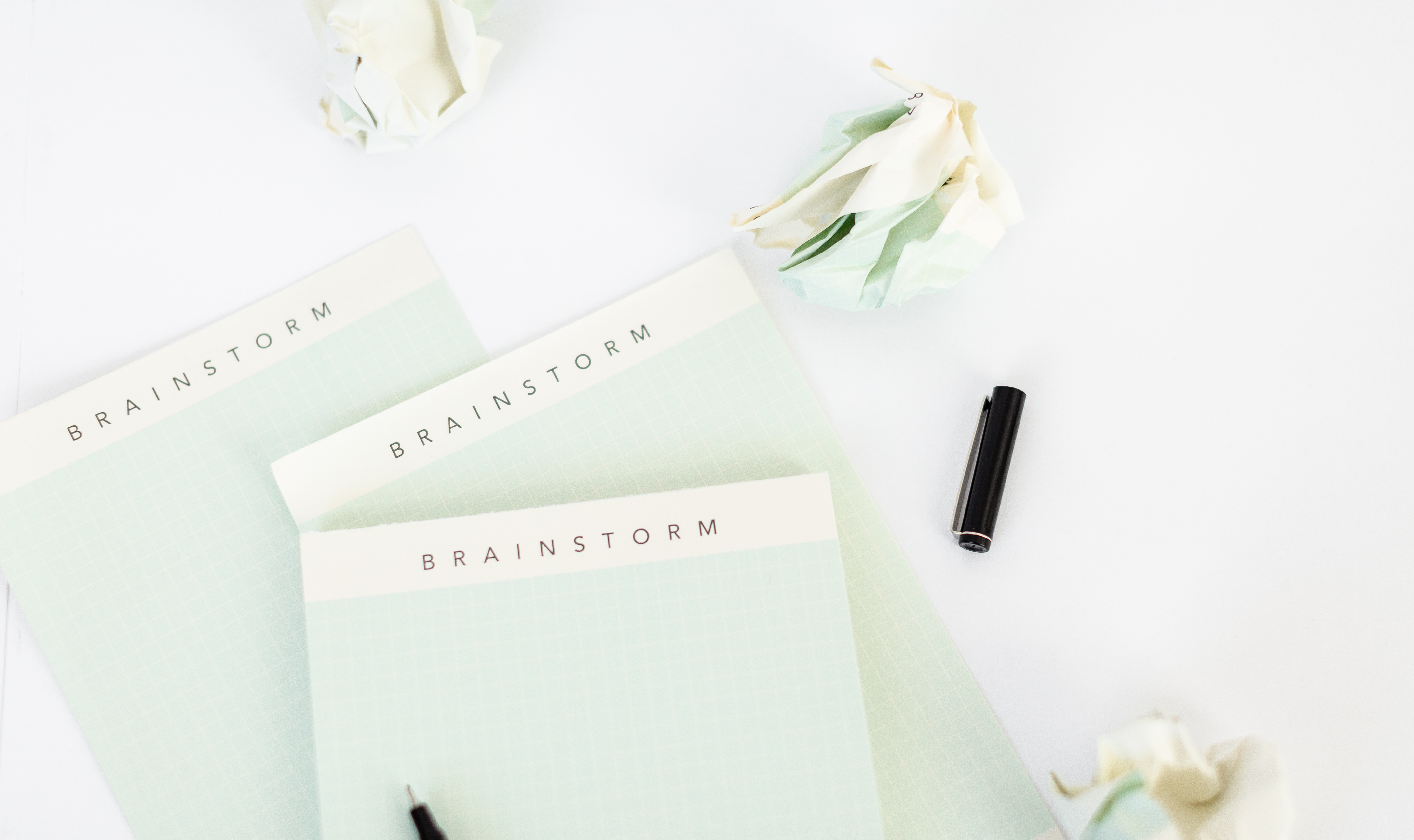 notebooks sitting on desk